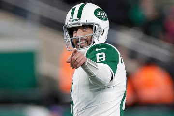 Jets' Aaron Rodgers Throws Incredible Hail Mary TD Pass Before Halftime vs. Bills: A Thrilling Highlight in an Epic AFC East Showdown